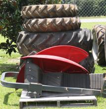 Misc MF tractor items: 4 used tires, 1 roll bar and 2 fender flares.